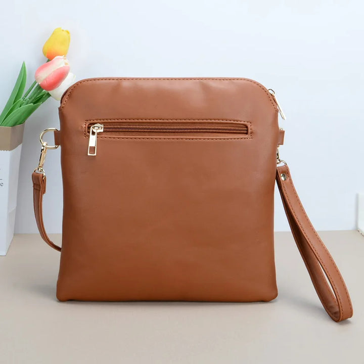 Tiffany - crossbody tas met kwastjes en koeienprint