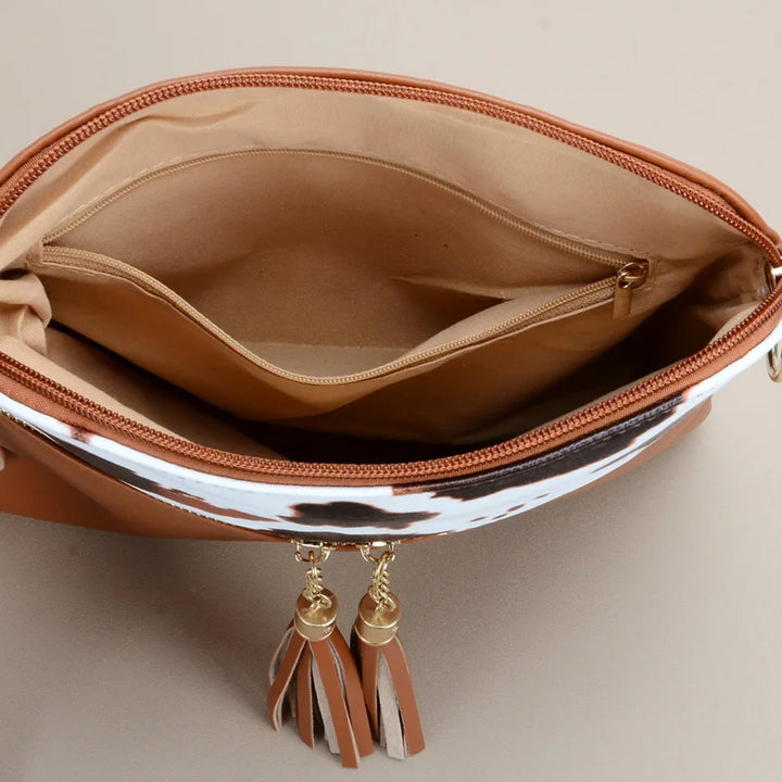 Tiffany - crossbody tas met kwastjes en koeienprint