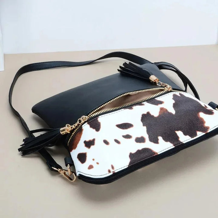 Tiffany - crossbody tas met kwastjes en koeienprint