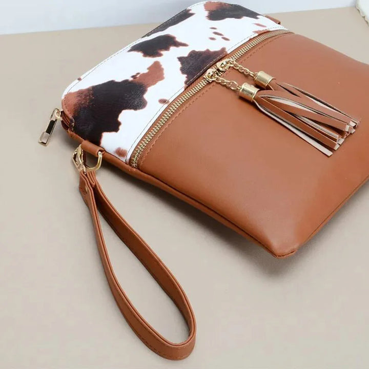 Tiffany - crossbody tas met kwastjes en koeienprint