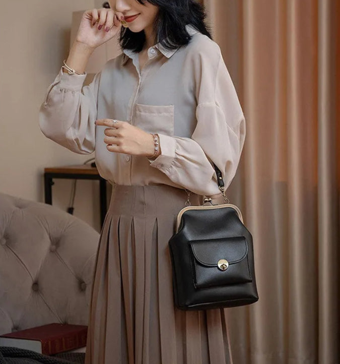 Aliyah - elegante schoudertas met gespclip